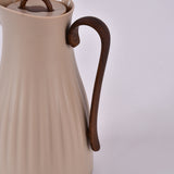 Beige water pot with wooden handle 1 litre